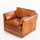 Vintage club armchair by Roche Bobois. Camel buffalo leather. France, 1980s.