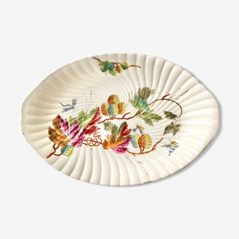 Porcelain serving dish decorated with plants and insects