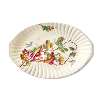 Porcelain serving dish decorated with plants and insects