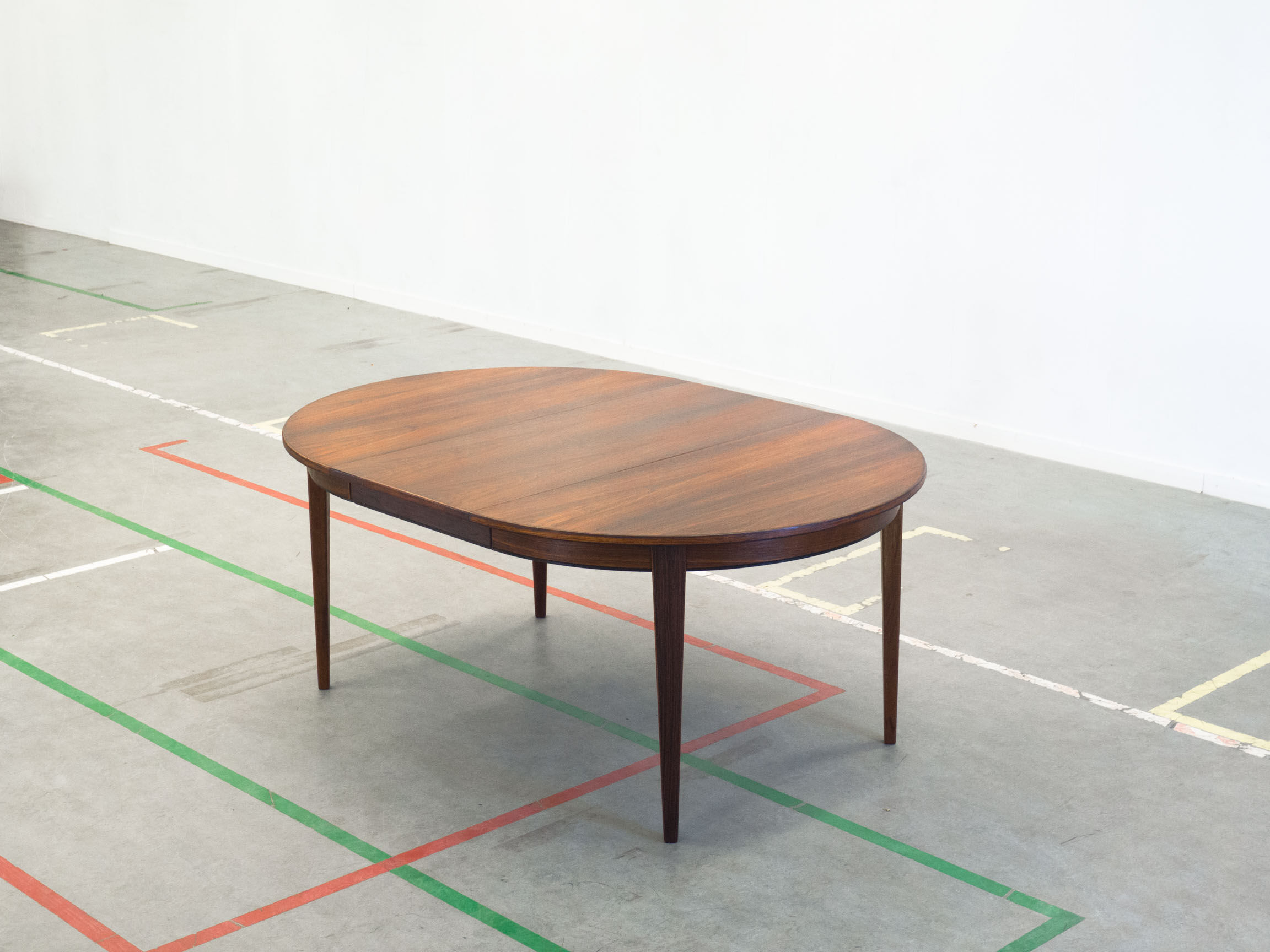 Omann Jun ‘Model 55’ extendable rosewood dining table