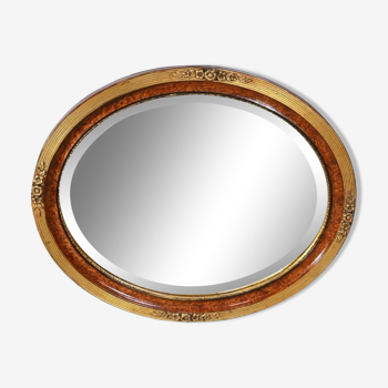 Oval mirror in gilded wood – early twentieth century