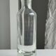 Small ribbed glass carafe, large round cap