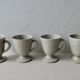 Set of 4 cups, 1 mazagran, 1 milk pot and 1 sugar bowl in pyrity sandstone, signed
