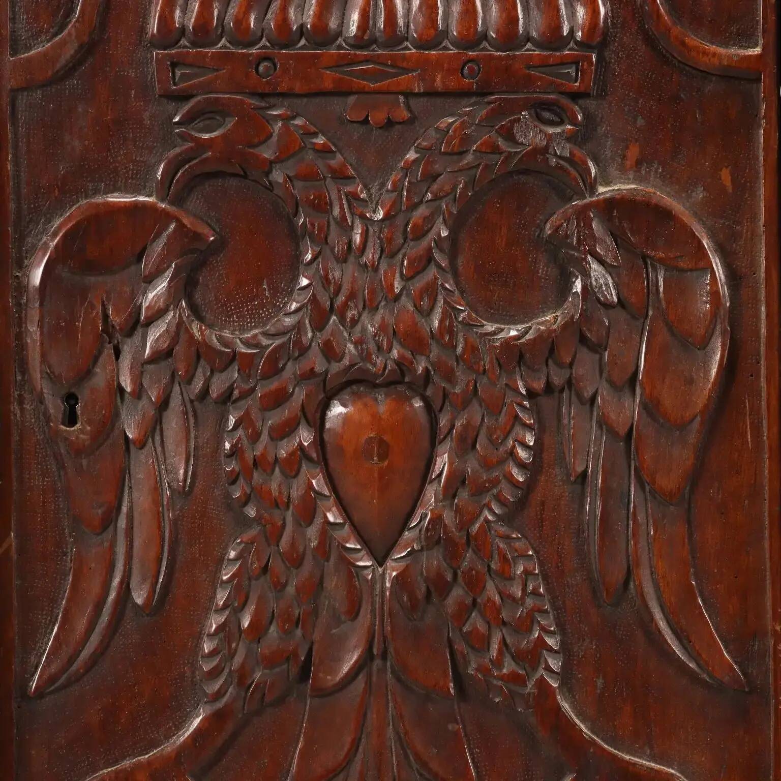 Antique walnut and fir wardrobe with drawers, Italy, 18th century.