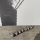 7 silver-plated metal swan name tags