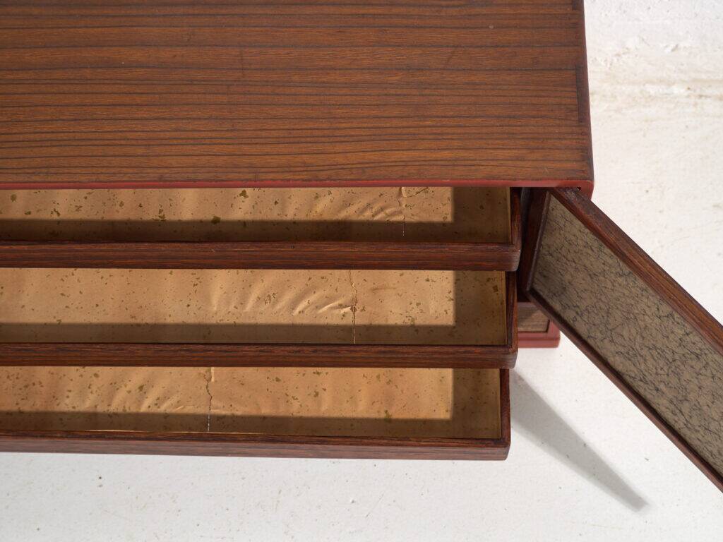 Small Japanese cabinet with sliding doors, Kabuki decoration, made of paulownia wood, early Showa period, circa 1926–1970.