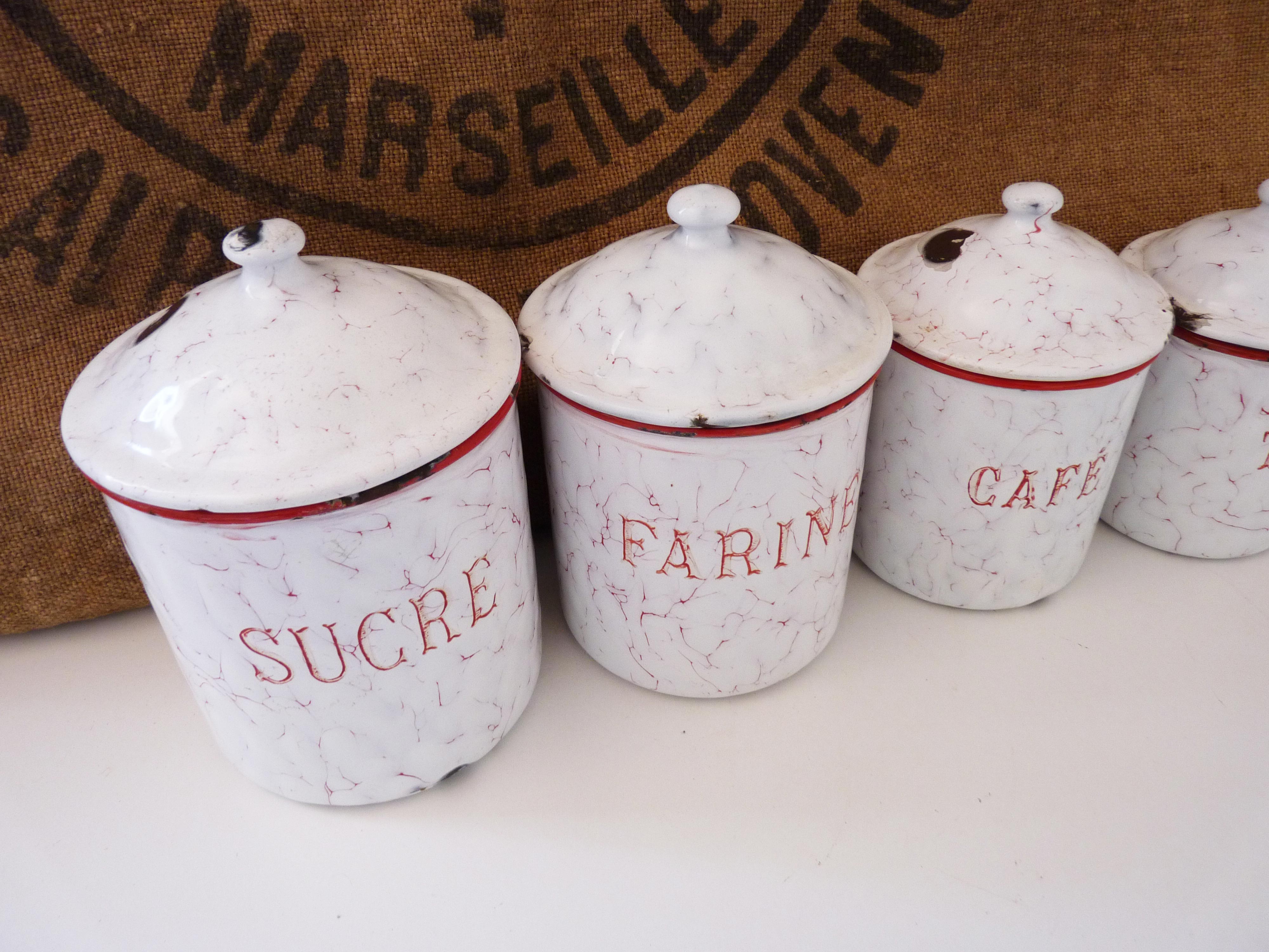 Series of 6 spice pots in white and red enamel for cooking