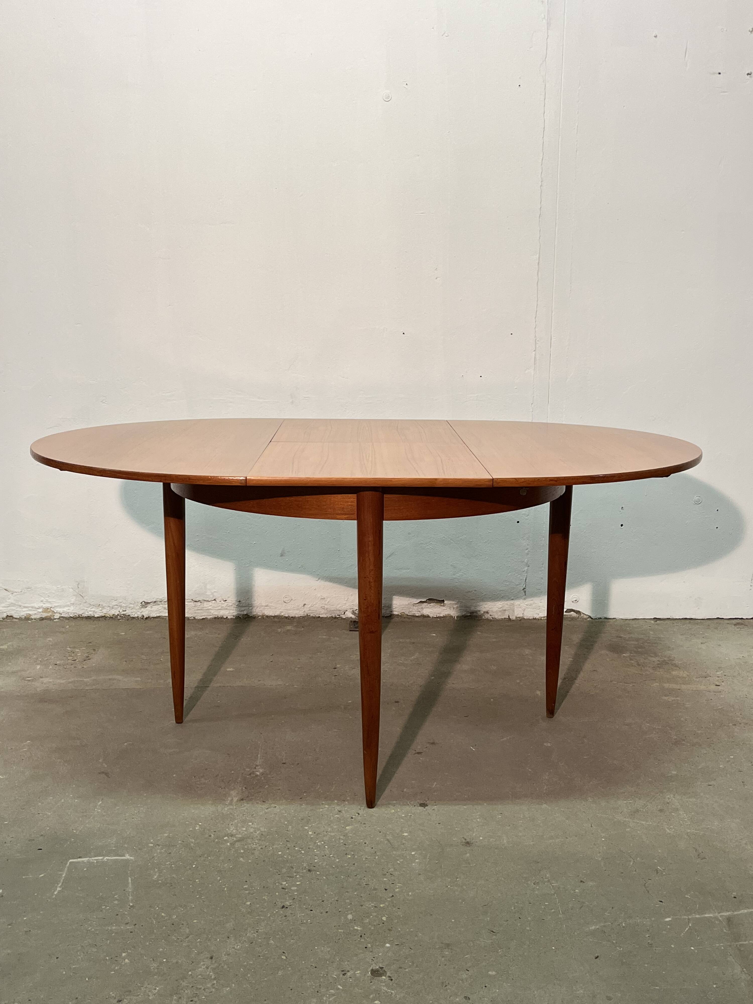 Vintage 1960s teak extendable Scandinavian table.