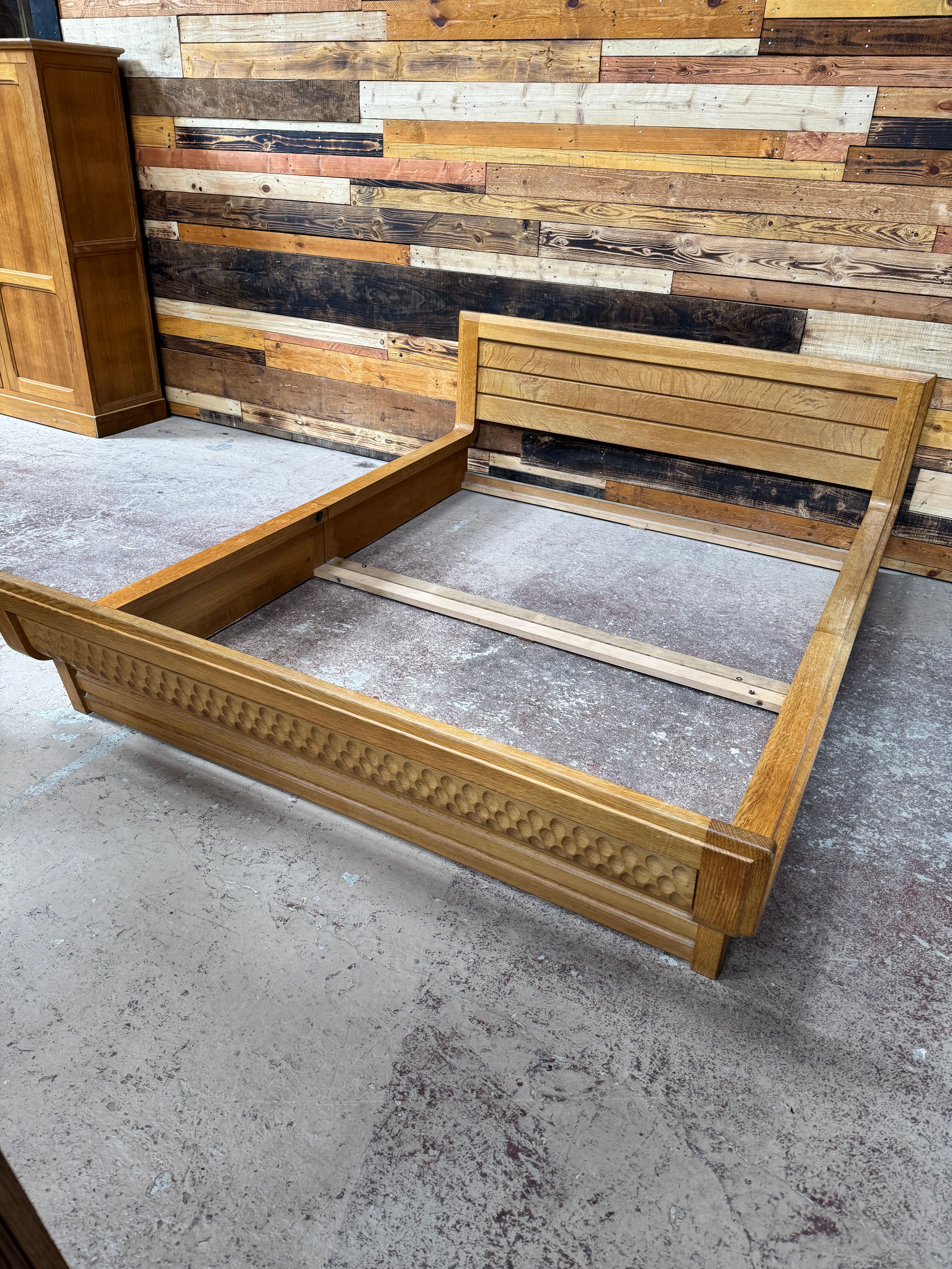 Sculpted oak bed by Guillerme & Chambron