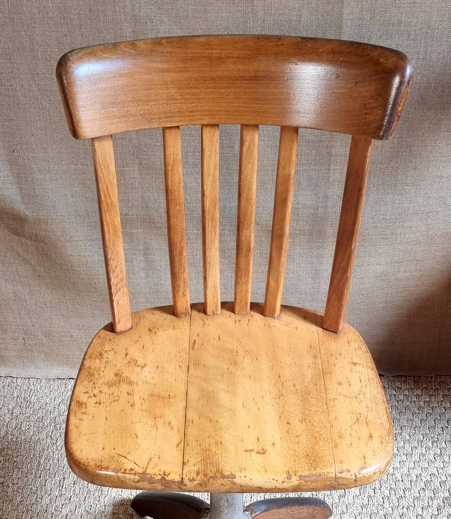 Height-adjustable rotating workshop office chair