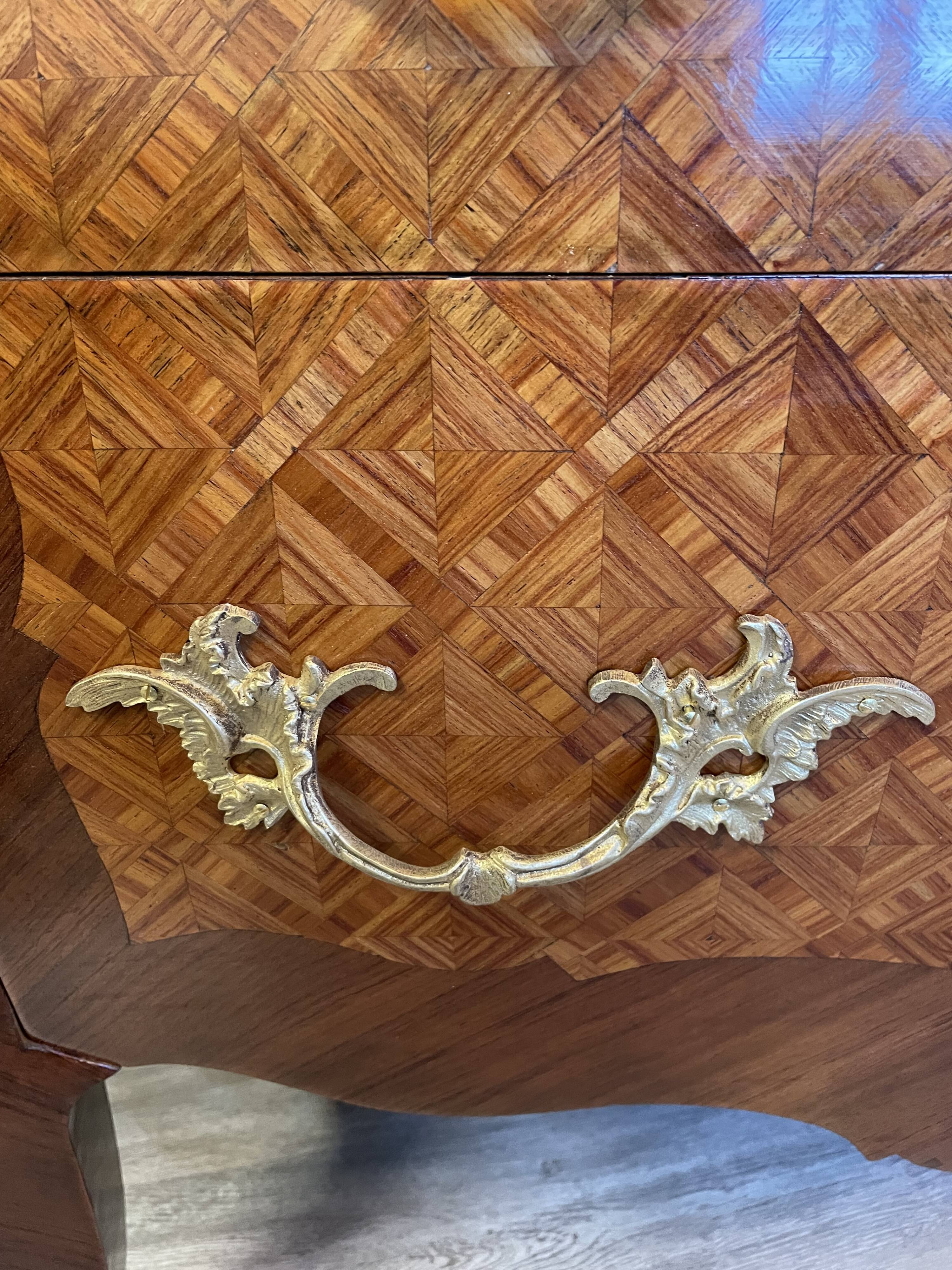 Louis XV chest of drawers in rosewood