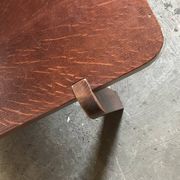 Mid-century coffee table in brown wood from the 1970s, rectangular top with rounded corners.