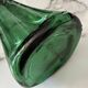 Vintage Viresa bottle in a flattened shape.