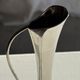 Vintage silver-plated soliflore vase in the shape of a ewer with a slender handle.