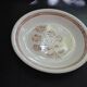 Service 7 assiettes creuses, plats et soupière à décor de fleurs