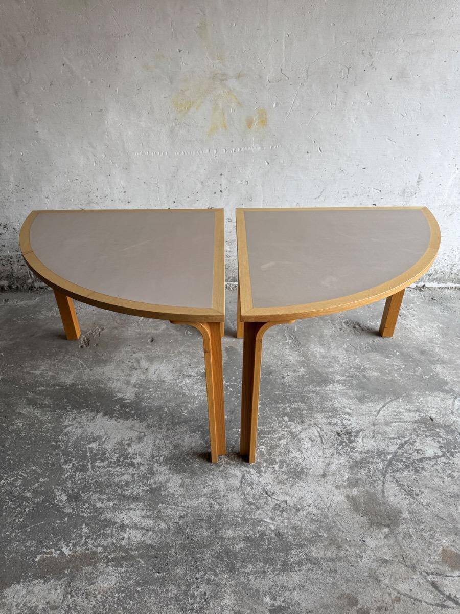 Set of 2 light-grey laminated and beech wood half-round dining tables by Magnus Olesen