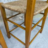 Pair of vintage wood and straw chairs