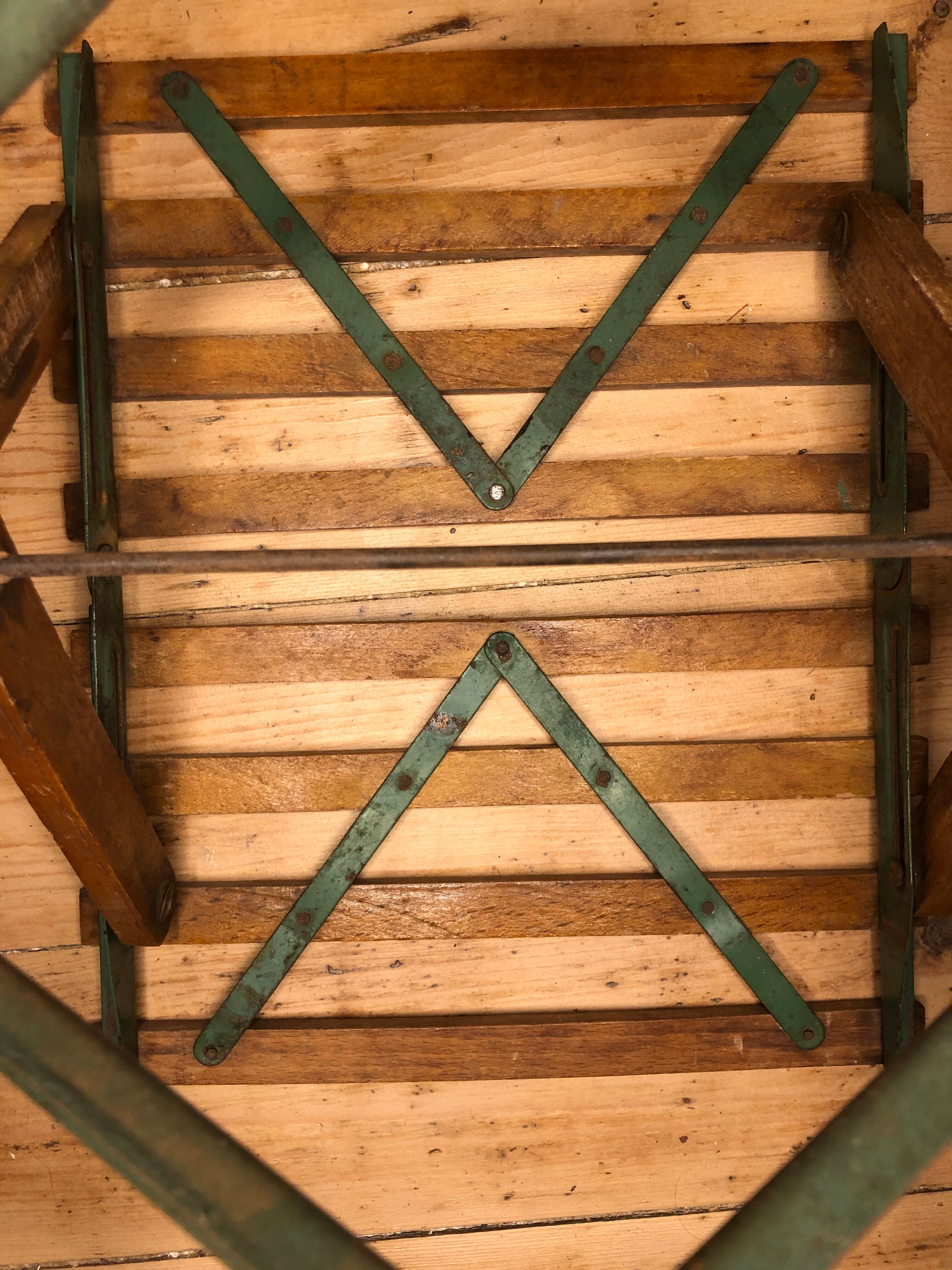 Wooden and iron slatting stool