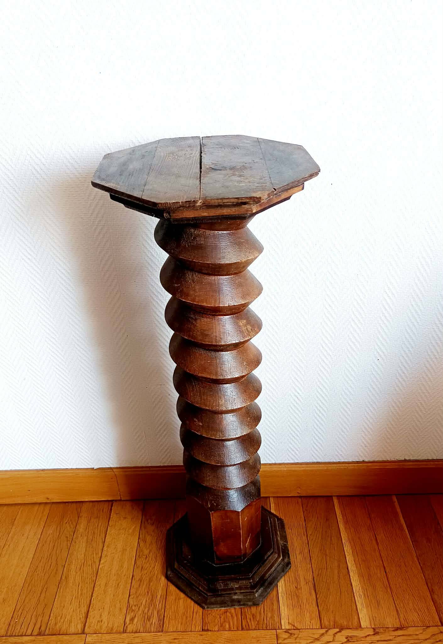Screw press stool in carved wood