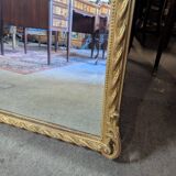 Very large Louis XVI style mirror in wood and gilded stucco with gold leaf