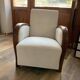 Set of 2 Hungarian Art Deco armchairs from the 1930s — brown wood, cream and beige fabric.