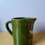Ceramic bird pitcher.