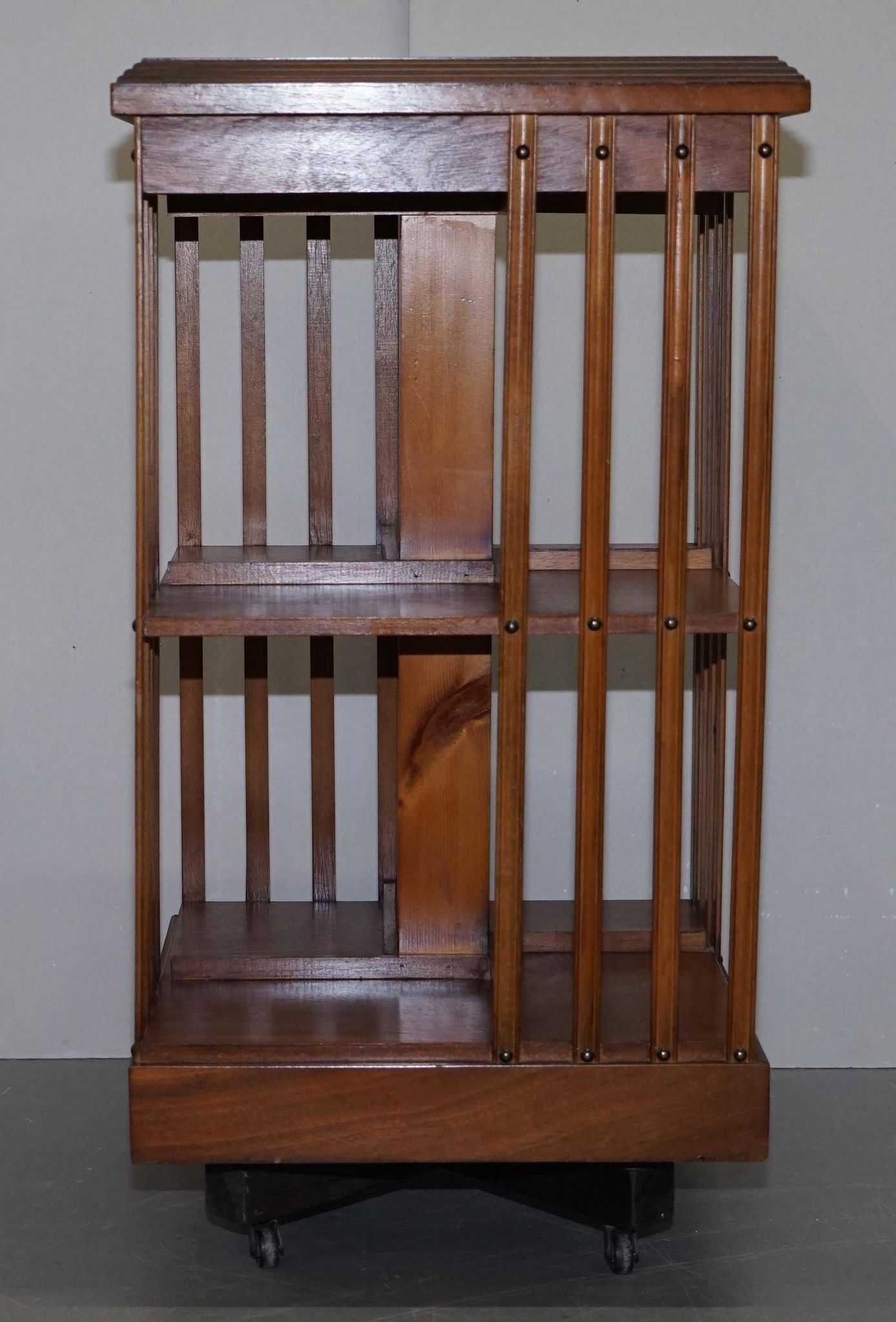 Edwardian revolving library in burl walnut with Sheraton inlay circa 1900