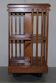 Edwardian revolving library in burl walnut with Sheraton inlay circa 1900