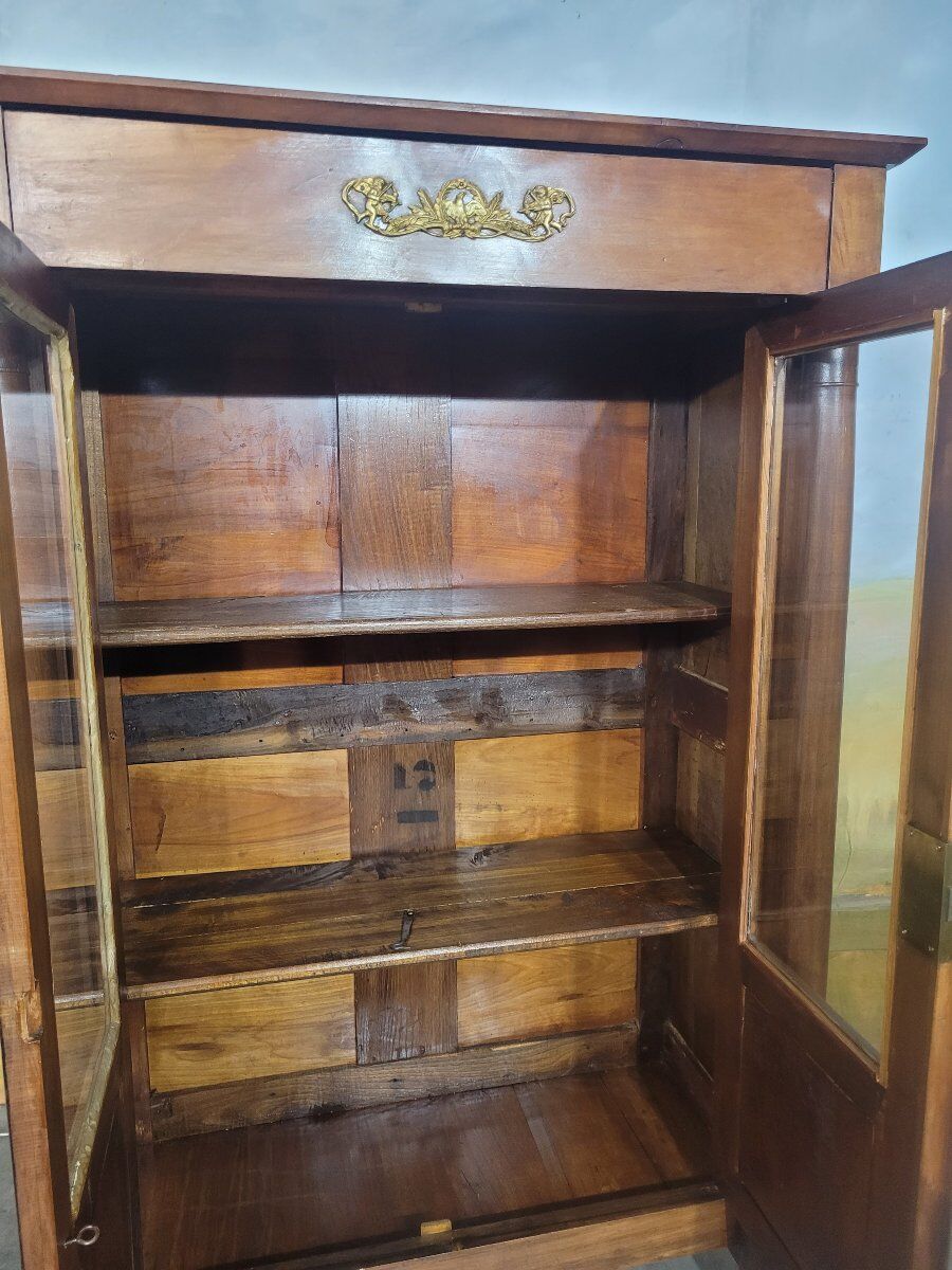 Small Empire library in cherry wood.