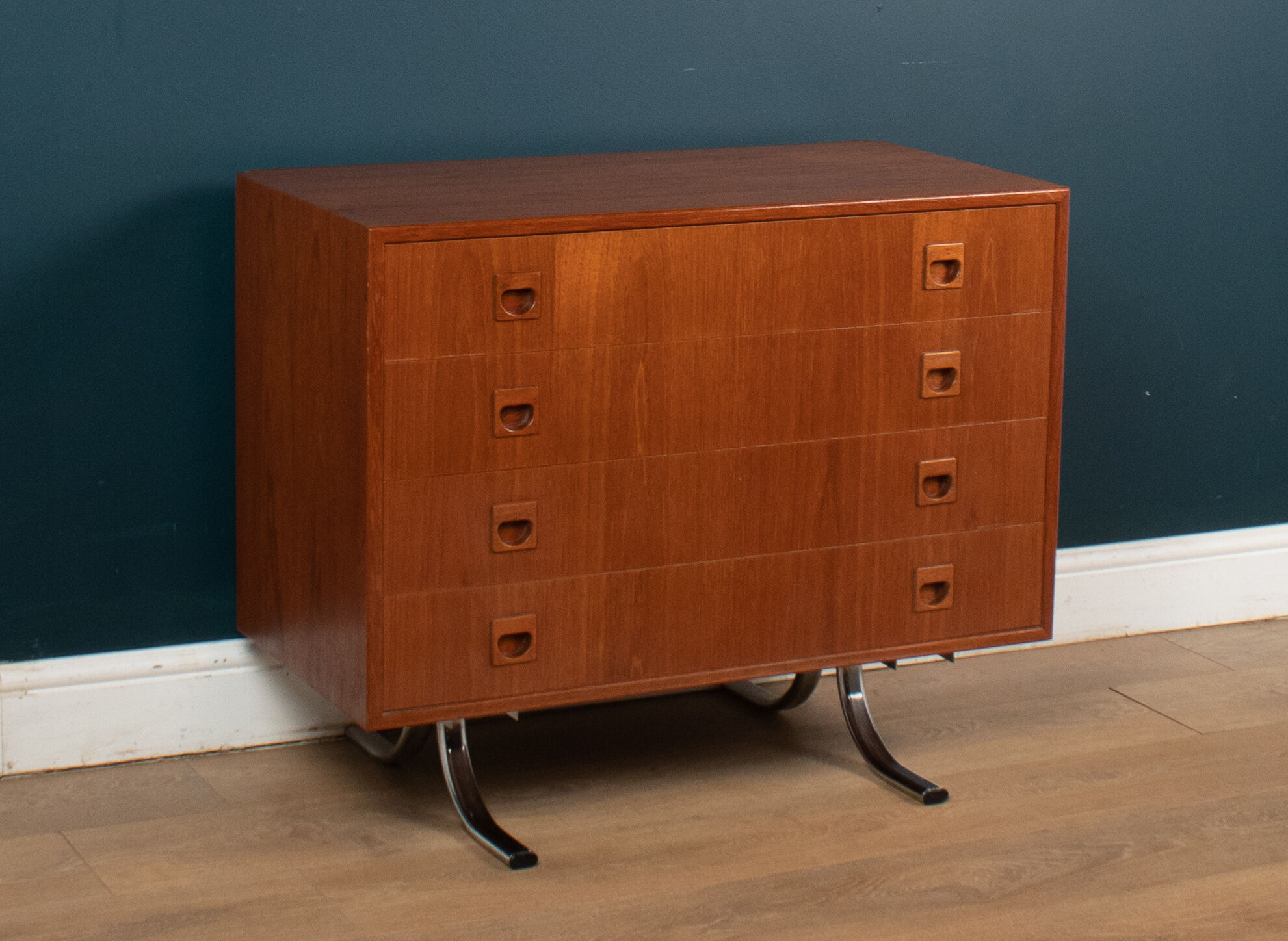 Retro teak 1960s danish chest of drawers on metal legs