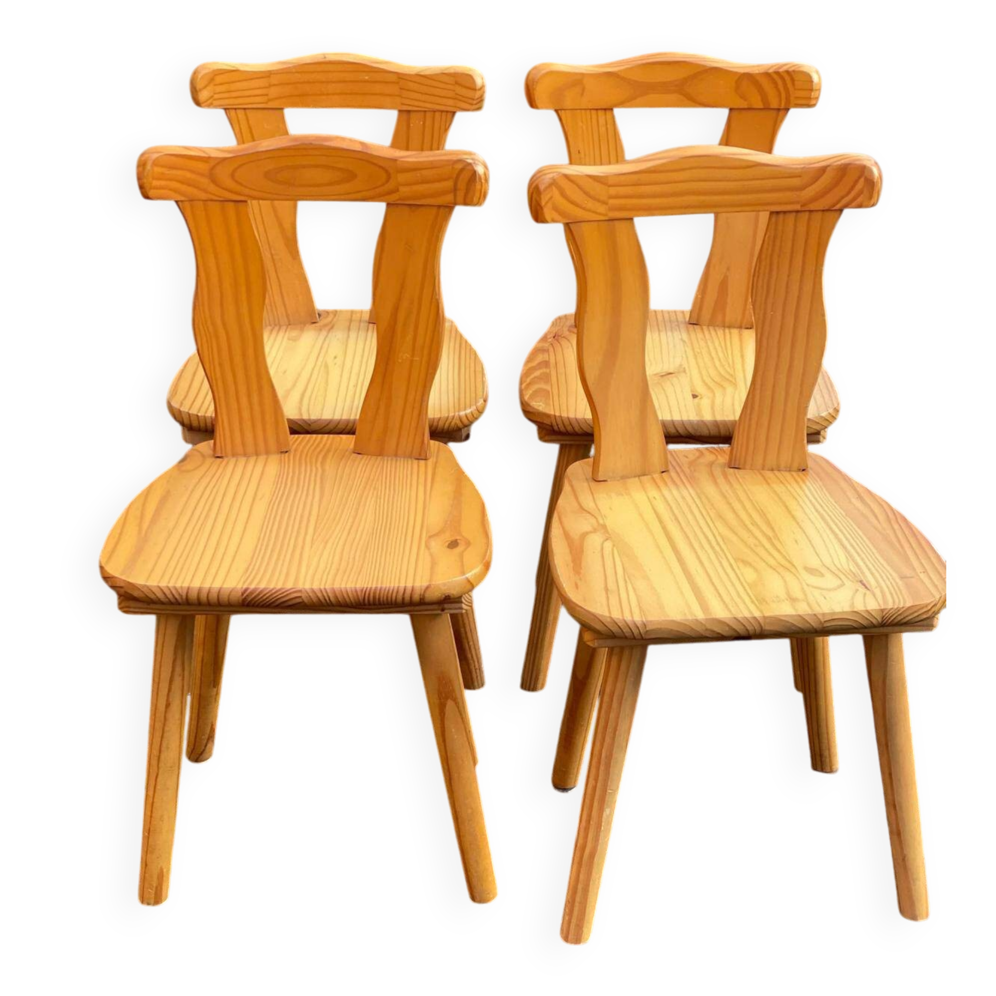 4 rounded Scandinavian dining chairs in solid pine from the 1980s.