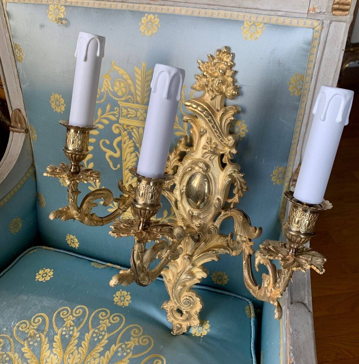 Pair of gilded bronze wall sconces