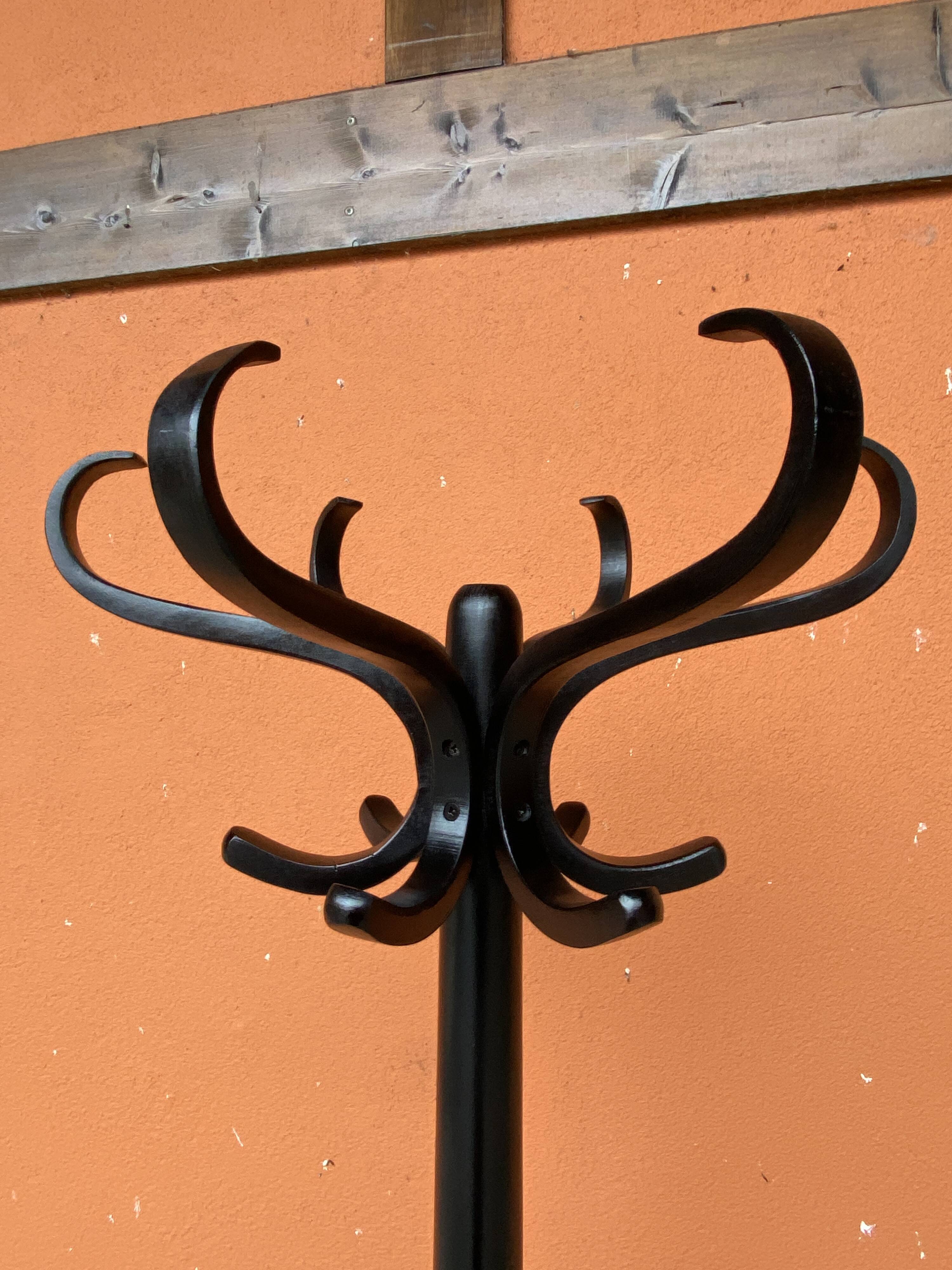Baumann coat rack on vintage parrot stand 70s curved wood