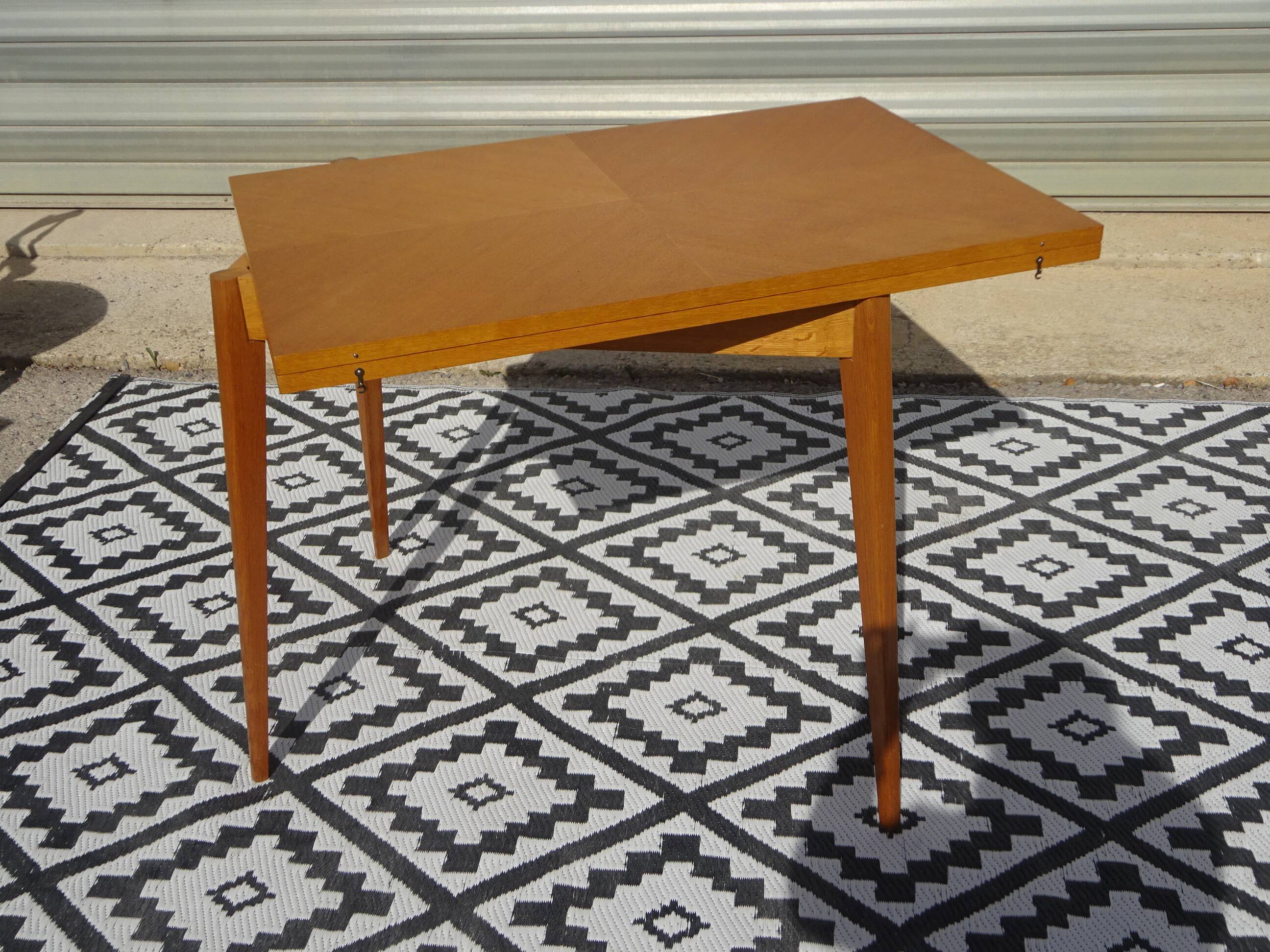 Scandinavian portfolio table model "half-century" by SAM