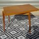 Scandinavian portfolio table model "half-century" by SAM