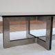 Smoked glass coffee table, brushed stainless steel base, 1970s.