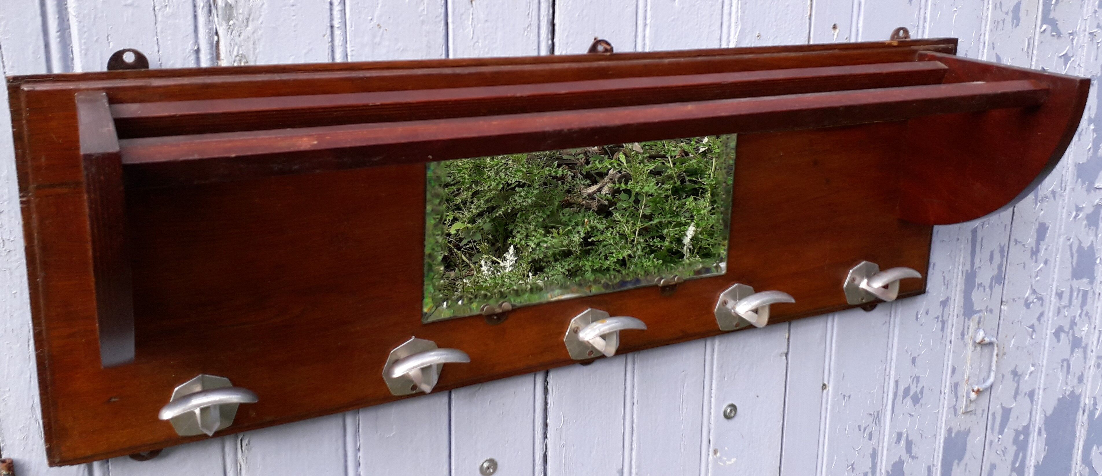 Art deco wall coat holder