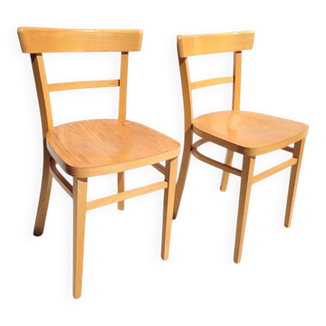 Pair of bistro chairs in light beech.