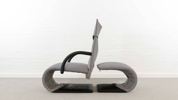 Fauteuil zen avec repose-pieds par claude brisson pour ligne roset