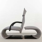 Fauteuil zen avec repose-pieds par claude brisson pour ligne roset