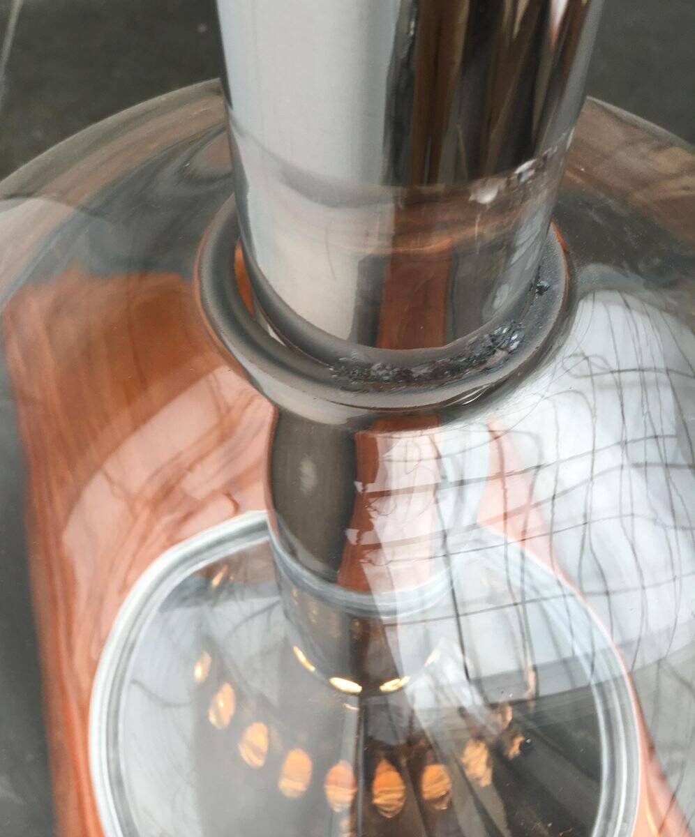 Suspended globe lamp in glass from the German space age by Erco.