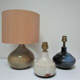 Three vintage ceramic lamps in blue, white and suede