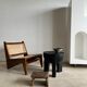 Black mango wood tripod side table with a semi-spherical top, height: 45 cm, diameter: 44 cm.