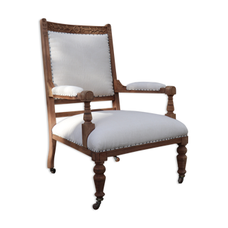 Nineteenth century wooden armchair, reupholstered in hemp
