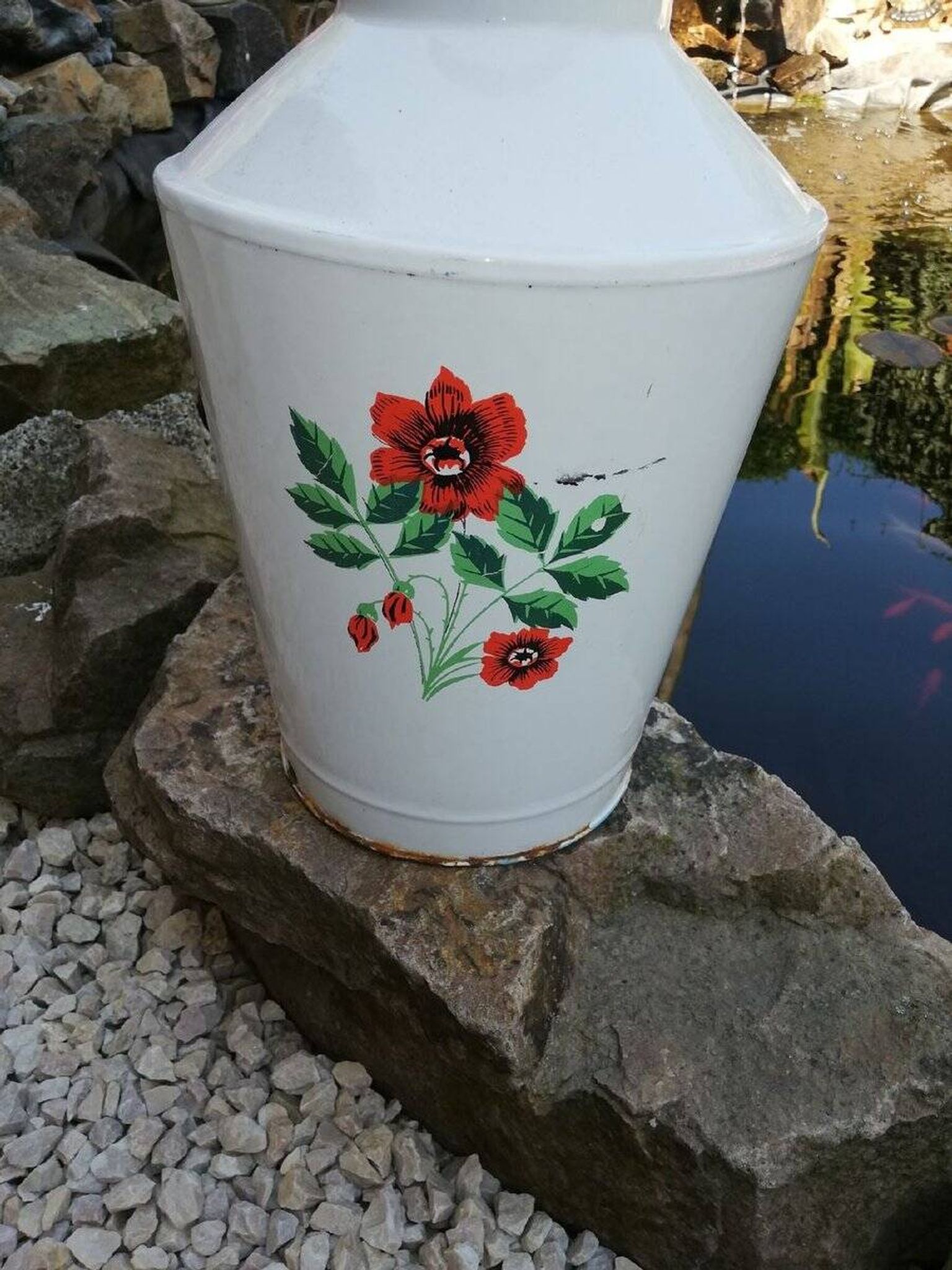 White enamelled metal water jug — 1950s, floral pattern and lid