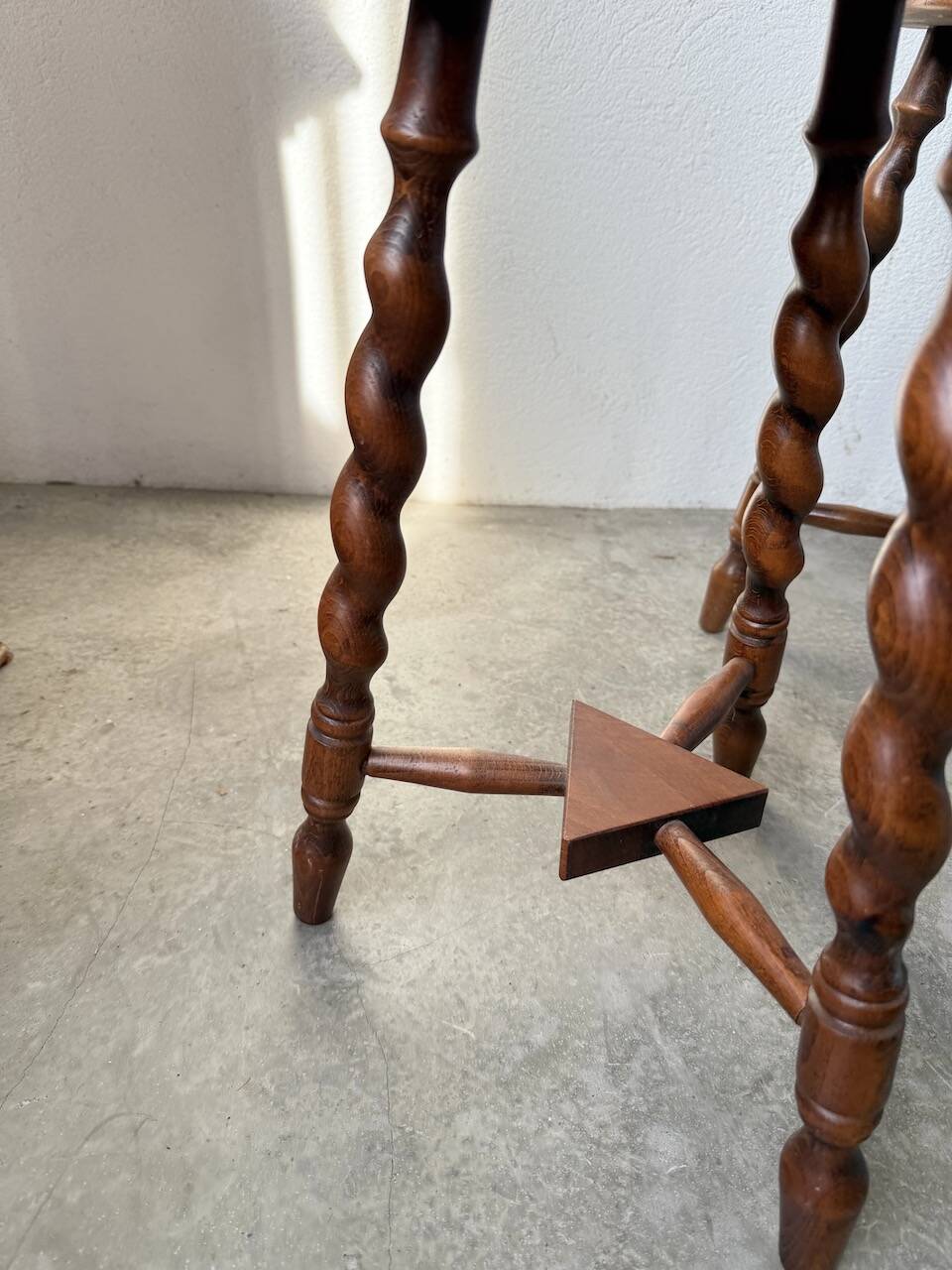 Set of 4 turned oak stools.