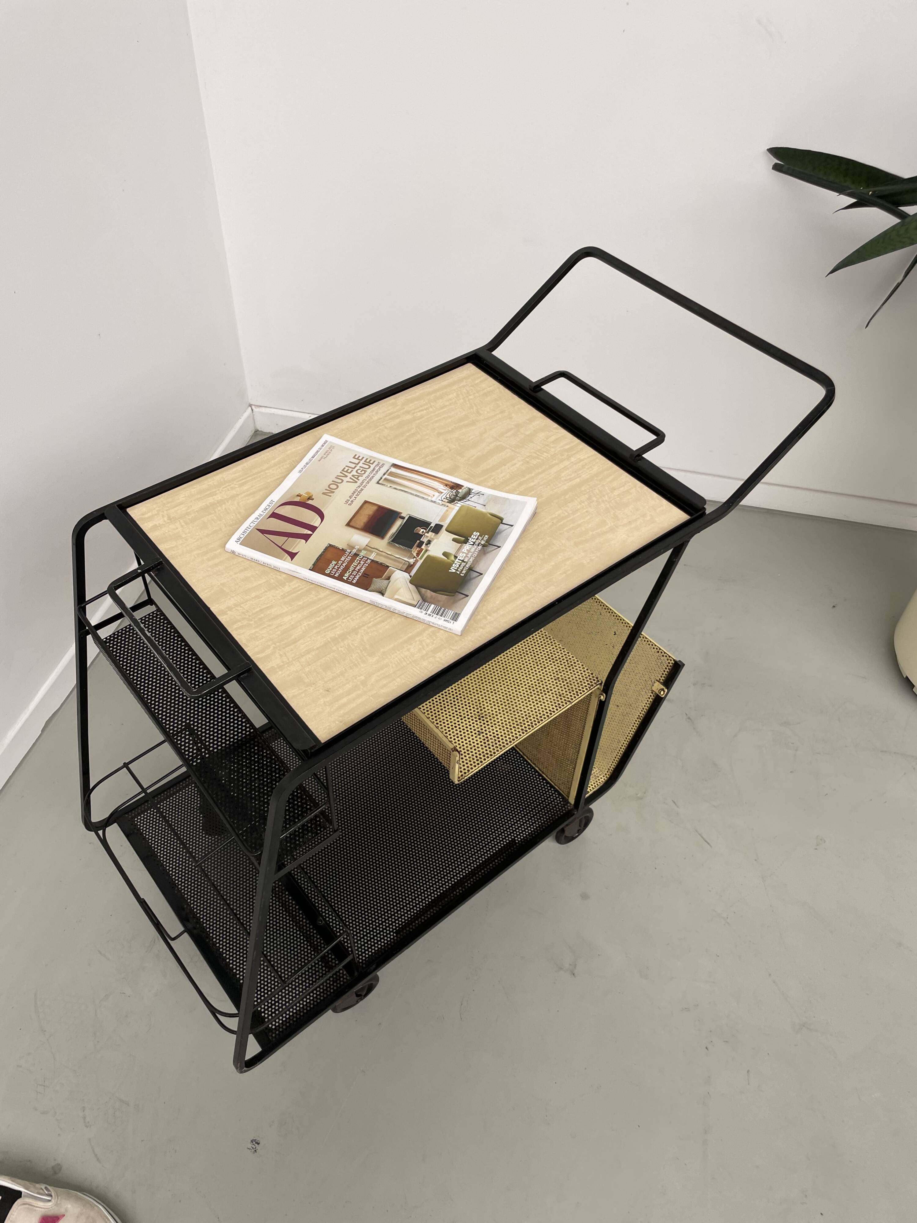 Perforated metal serving trolley in the Mathieu Matégot style