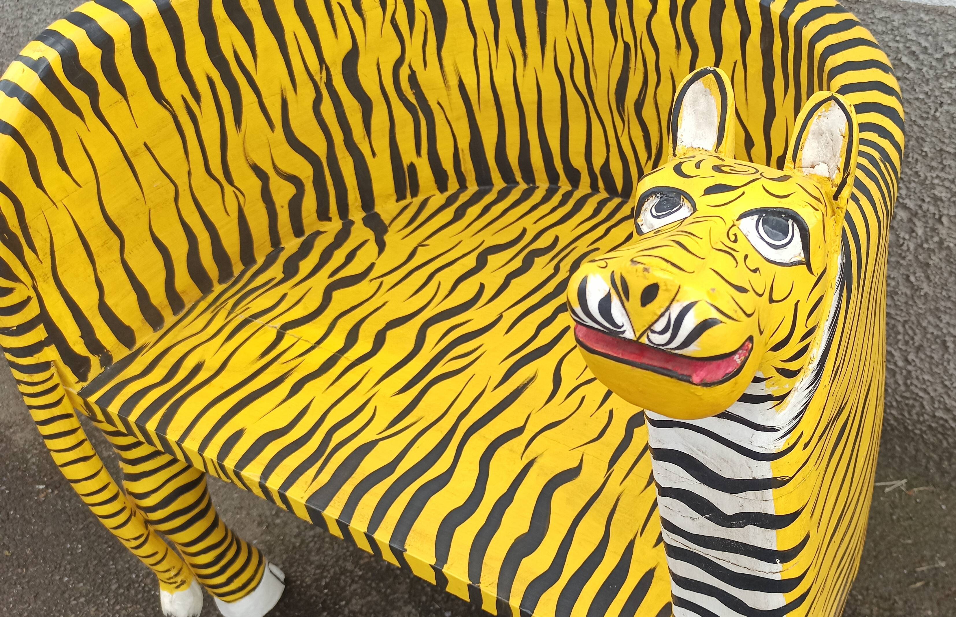 “Tiger” look wooden armchair