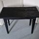 Table basse en bois brûlé