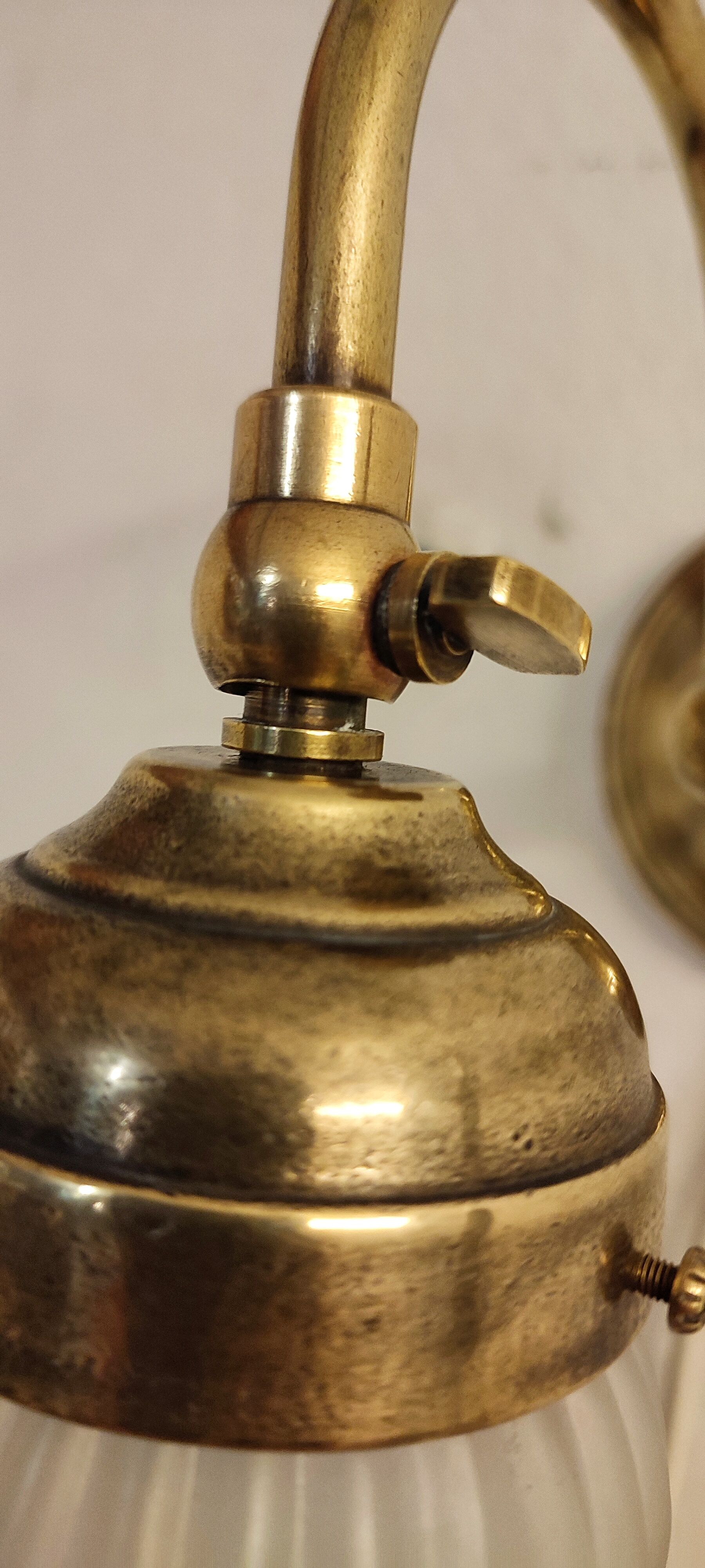 Bronze and glass wall lamp. Spain, 1940s.